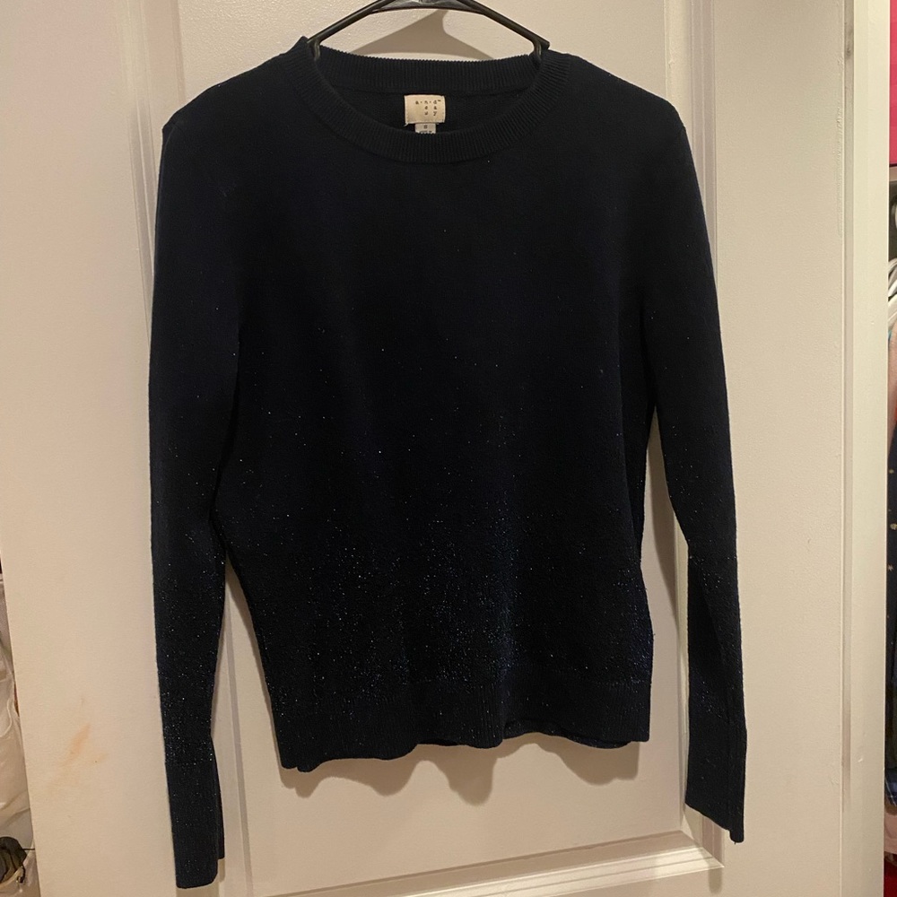 Women long sleeve shirt. Navy blue with sparkles at the bottom & on the sleeves